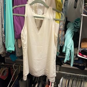 Sleeveless white blouse